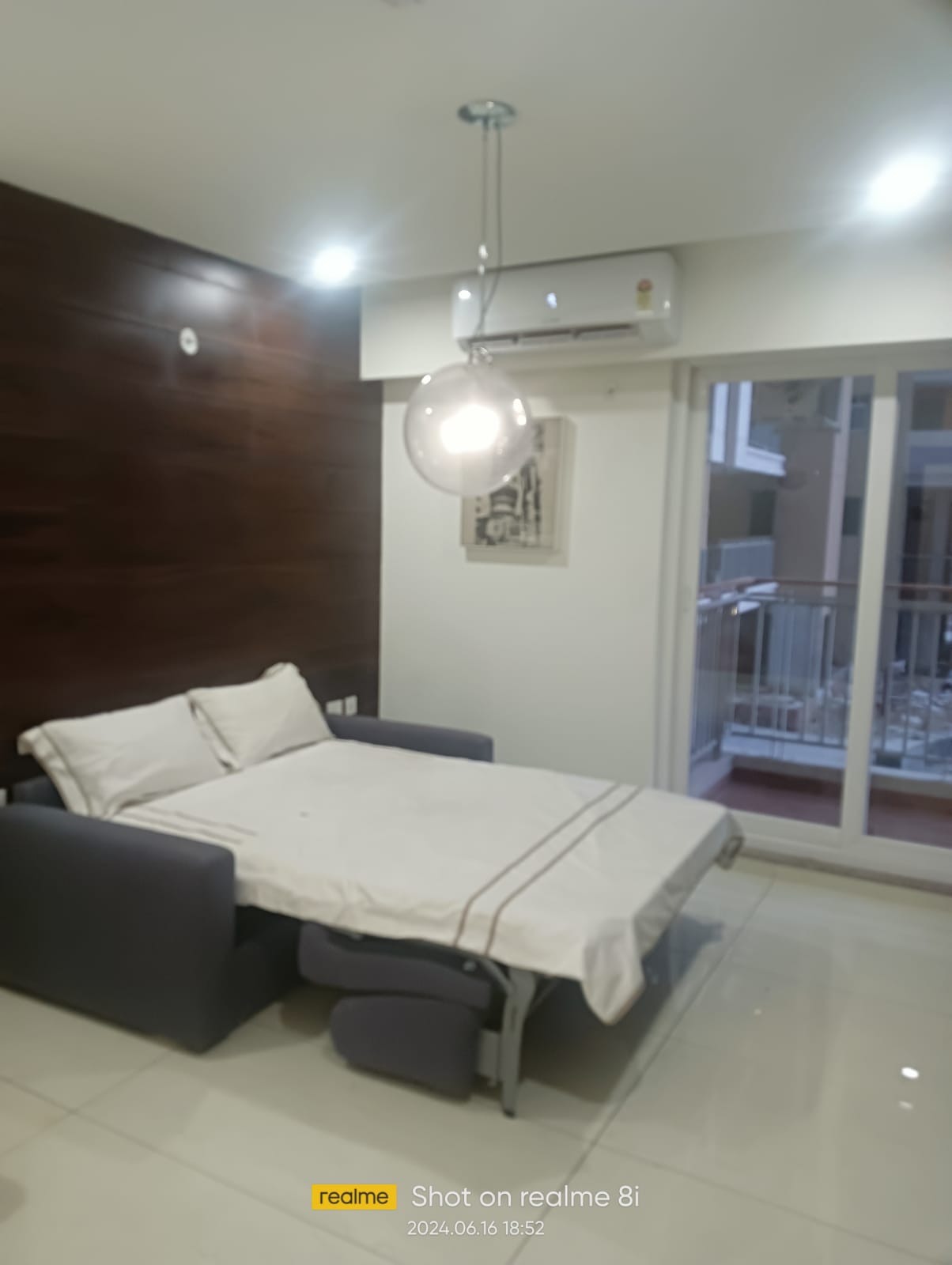 12. Guest Bedroom with Sofa Cum Bed
